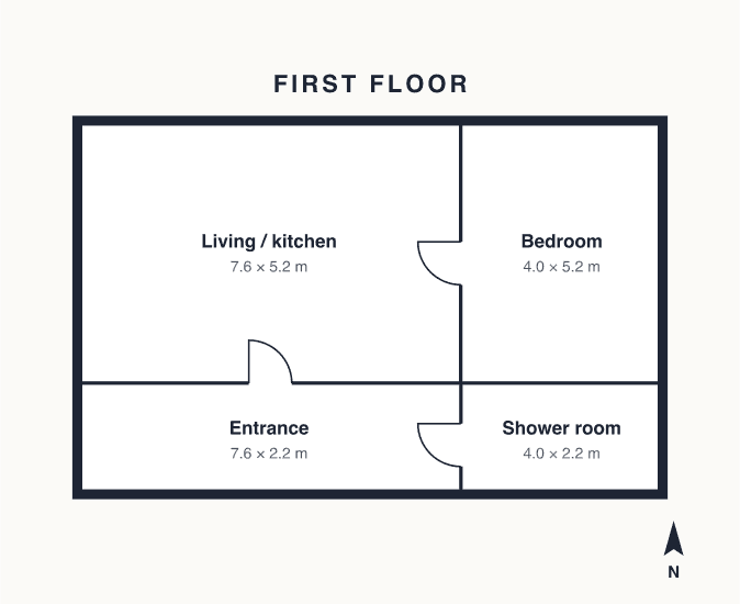 Floor plan of The Granary: an open living room and kitchen, a bedroom, a shower room and the entrance.